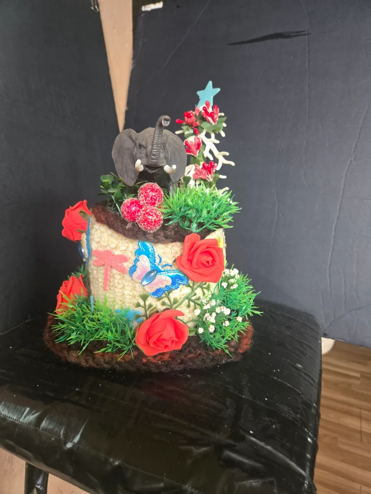 Handmade Elephant Figurine with Floral Decoration thumbnail