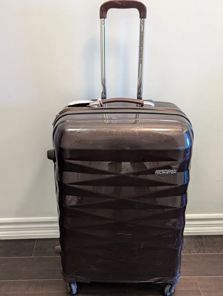 American Tourister Spinner 23"- Wine color image indicator(8)