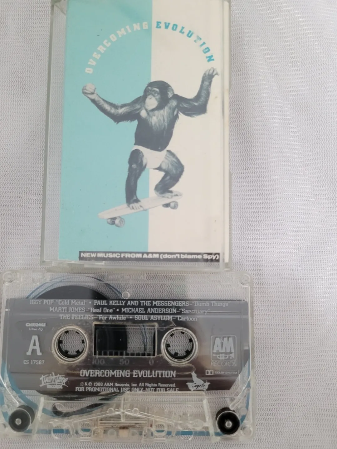 A&M Records sampler - Overcoming Evolution Cassette Tape 🇨🇦 thumbnail