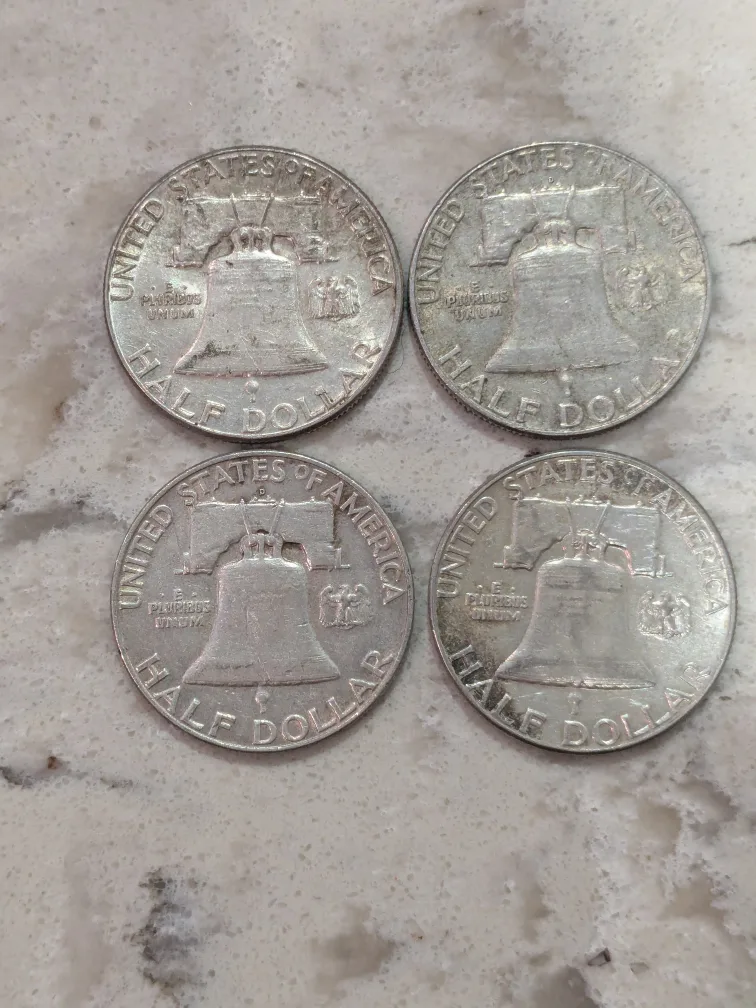 Four Franklin silver Half Dollars image indicator(2)