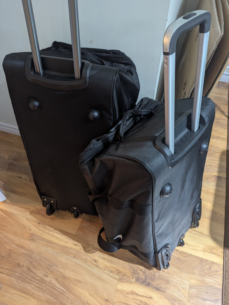 Black  and grey Rolling Duffel Bag