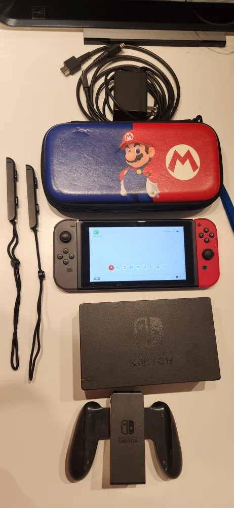 Nintendo Switch V2 Console with Case and accesories thumbnail
