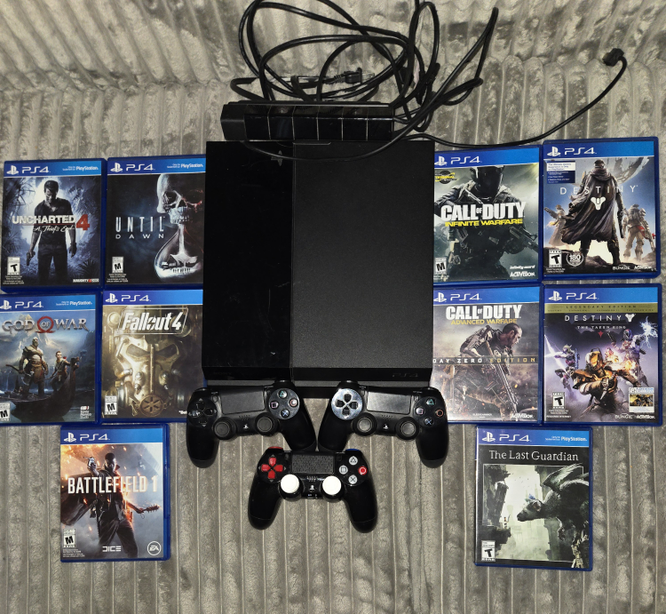 PlayStation 4 with Games and Controllers