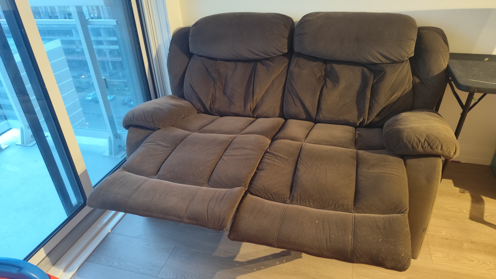 Brown Reclining two seater sofa