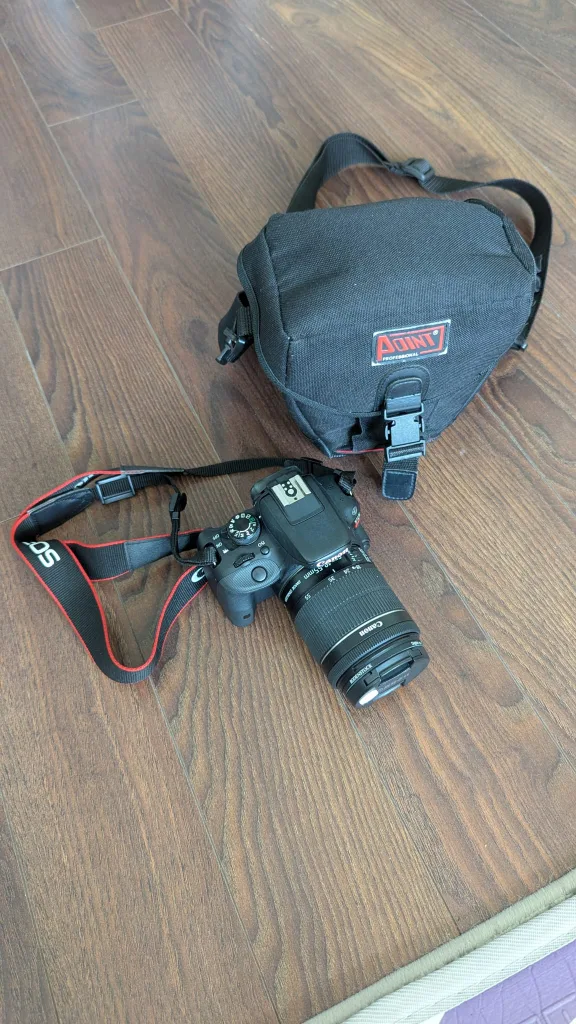 Canon EOS Rebel SL1 DSLR Camera + 18–55mm Lens + Camera Bag image indicator(3)