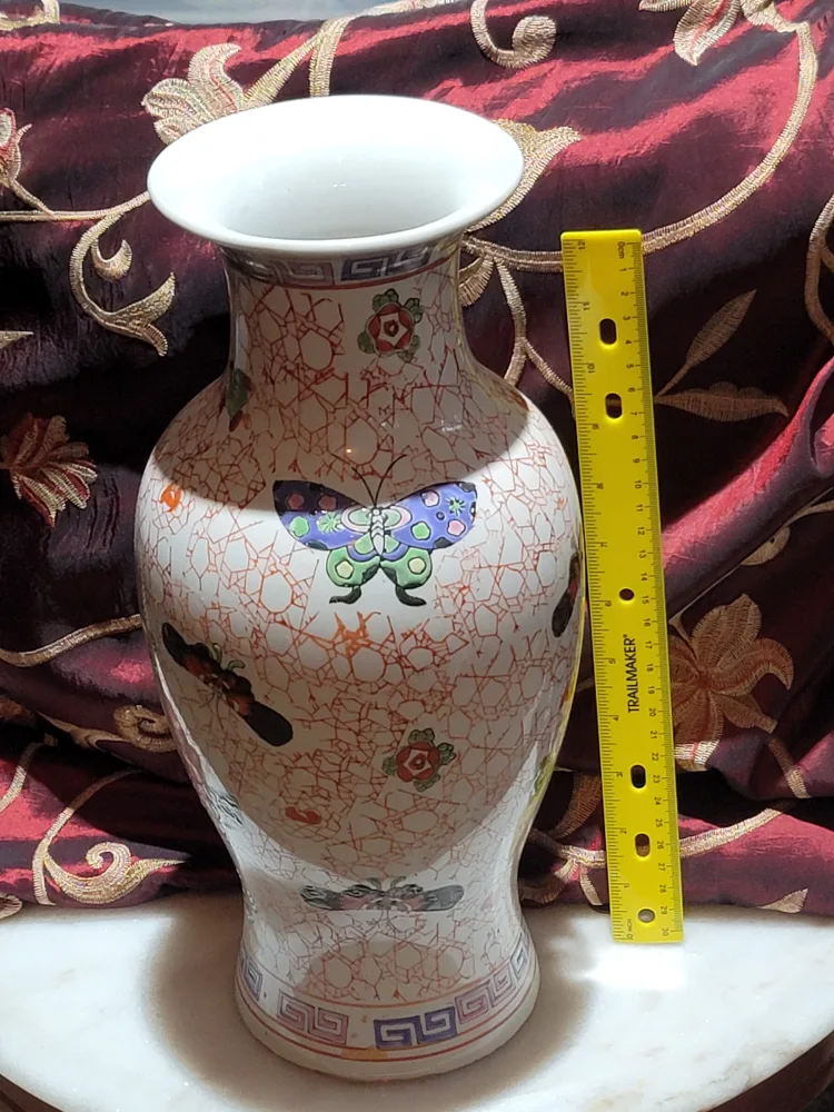 Decorative Vase with Butterfly Design thumbnail