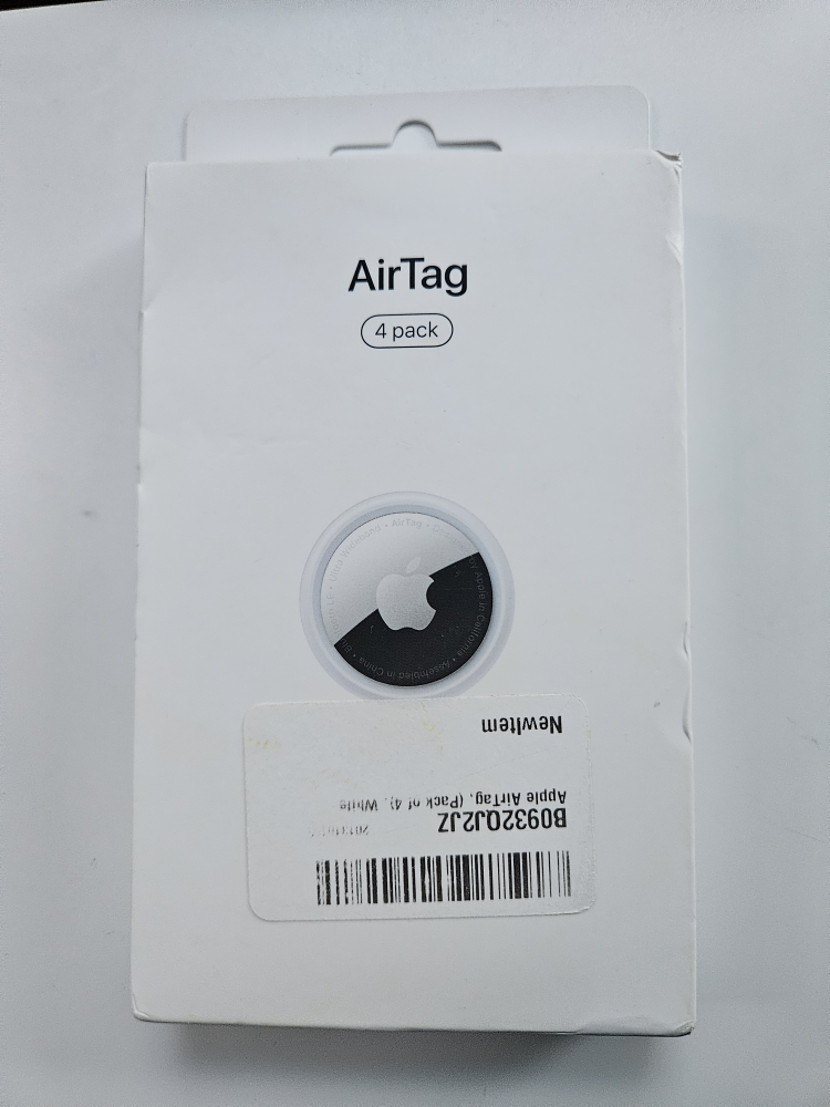New Apple AirTag 4 Pack - Never Opened! - photo 2