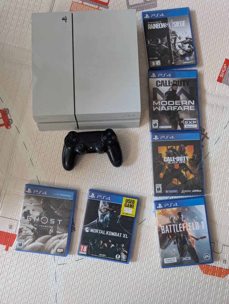PlayStation 4 (PS4) with Games