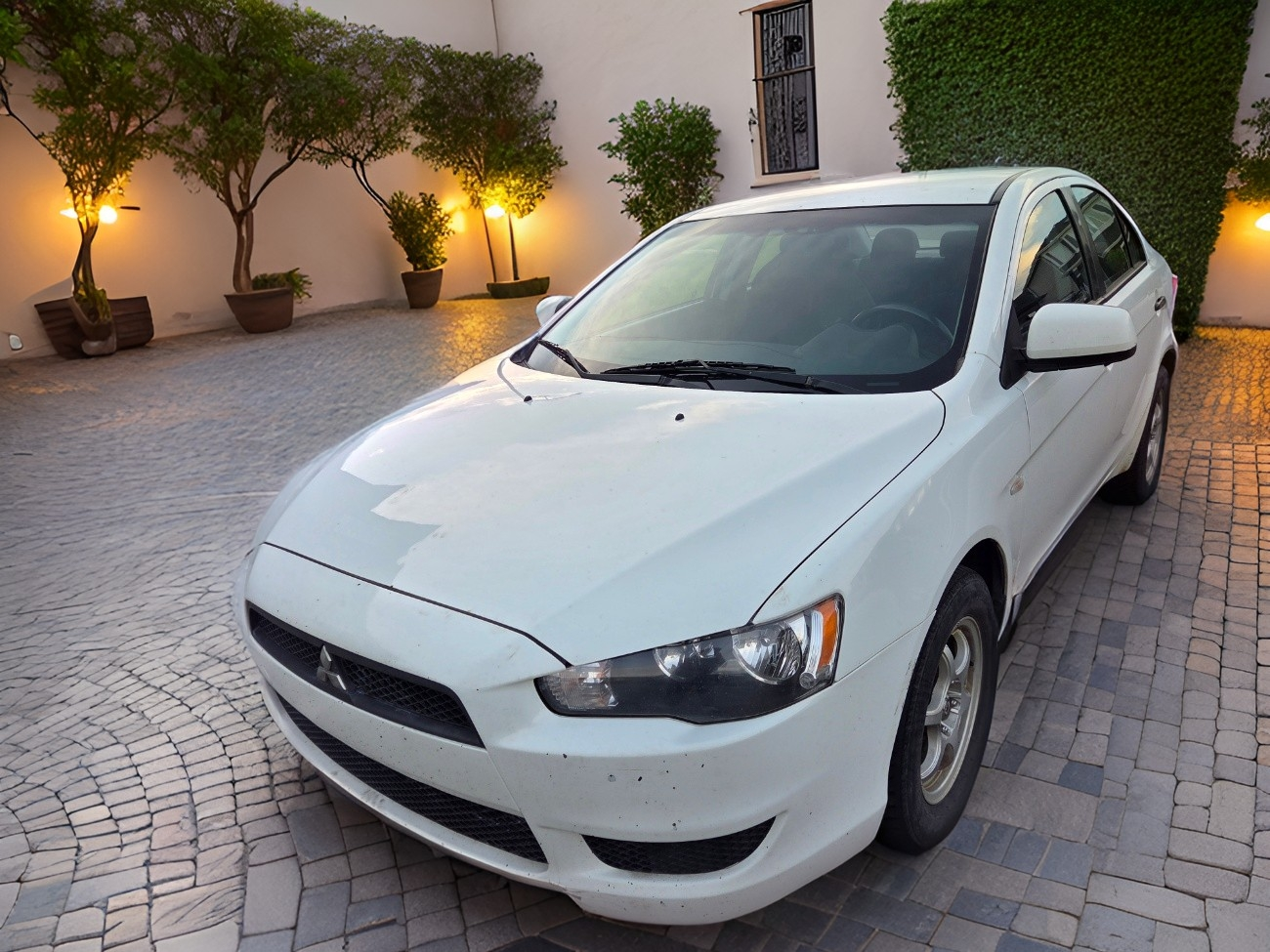 Mitsubishi Lancer - White Sedan