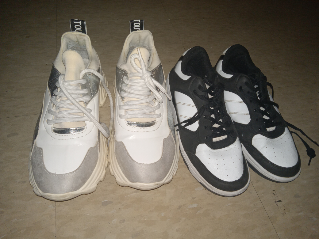Two sneakers sizes 7.5 and 9