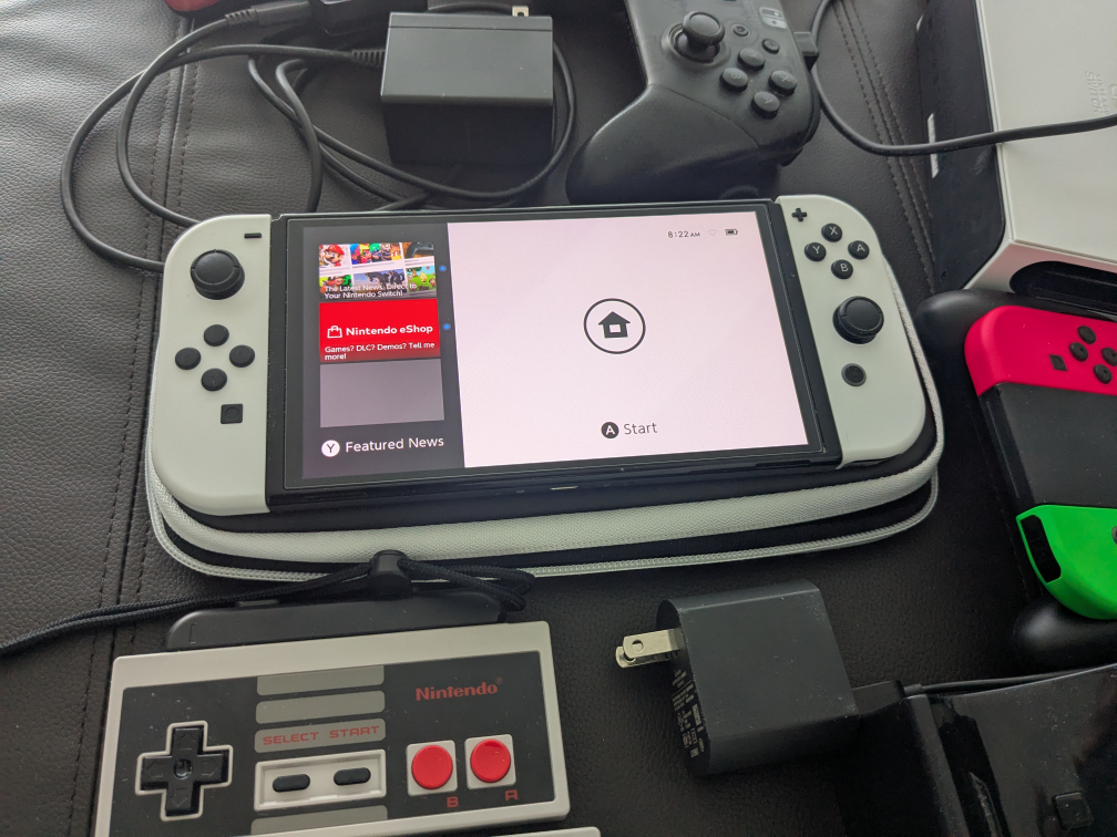 nintendo switch oled + controllers + chargers $325 obo - photo 2