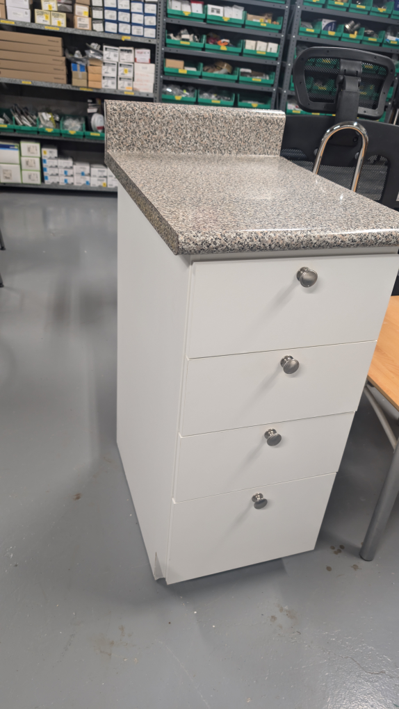 White Cabinet with wood coated Countertop
