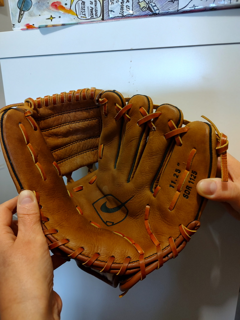 For sale baseball glove with energy arrest padding.