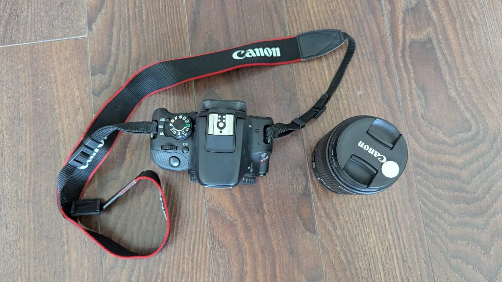 Canon EOS Rebel SL1 DSLR Camera + 18–55mm Lens + Camera Bag image indicator(5)