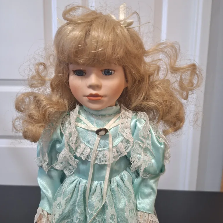 Porcelain Doll with Lace Dress image indicator(2)