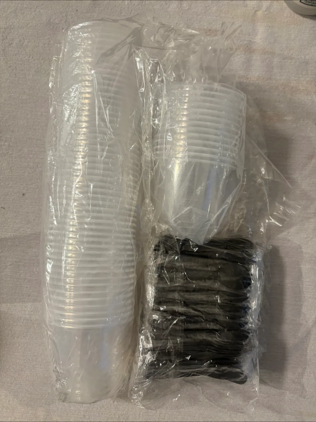 Plastic Cups and Black Spoons thumbnail