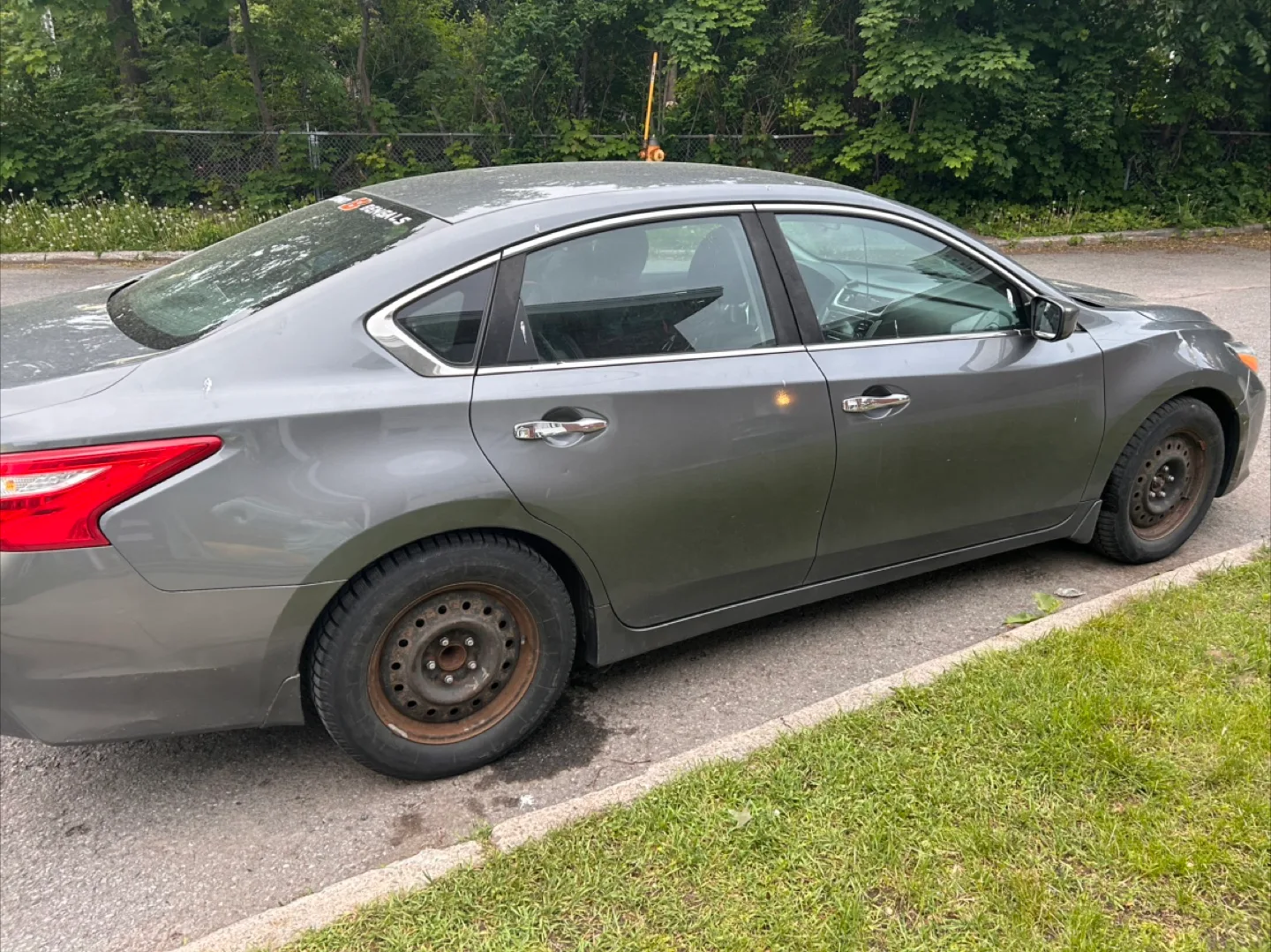Nissan Altima - Gray Sedan thumbnail