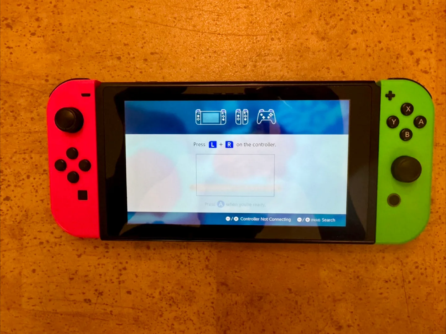 Nintendo Switch with extra controllers thumbnail