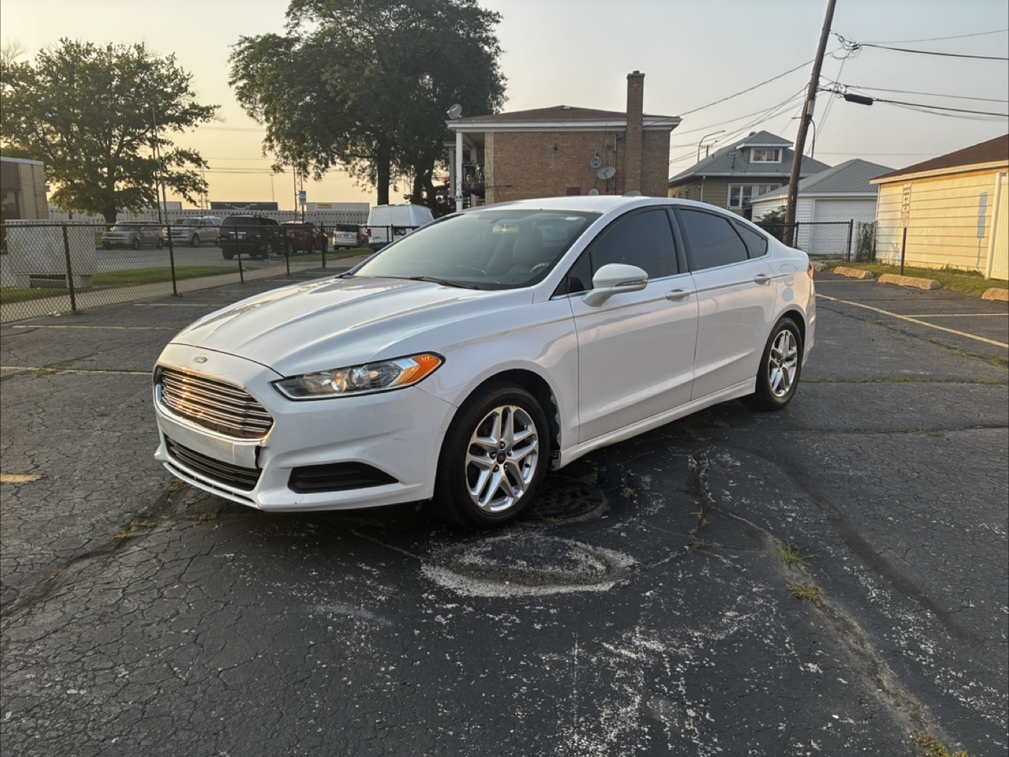 White Ford Fusion Sedan 2014