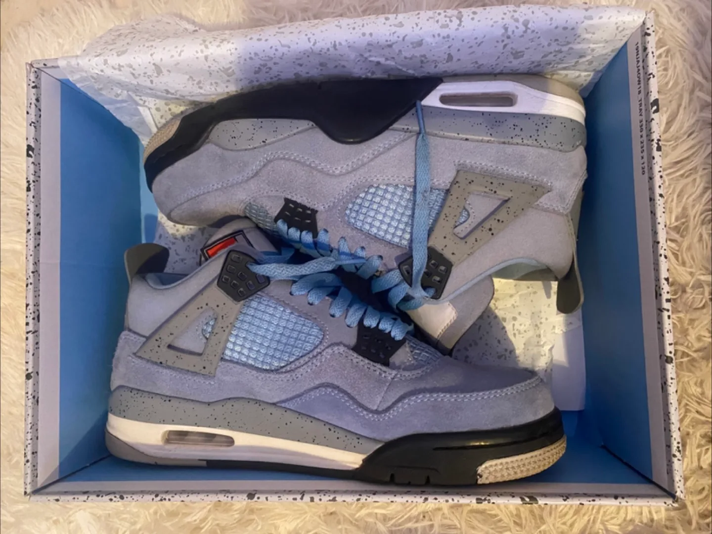 Jordan 4 Retro University Blue UNC | Size 9 thumbnail