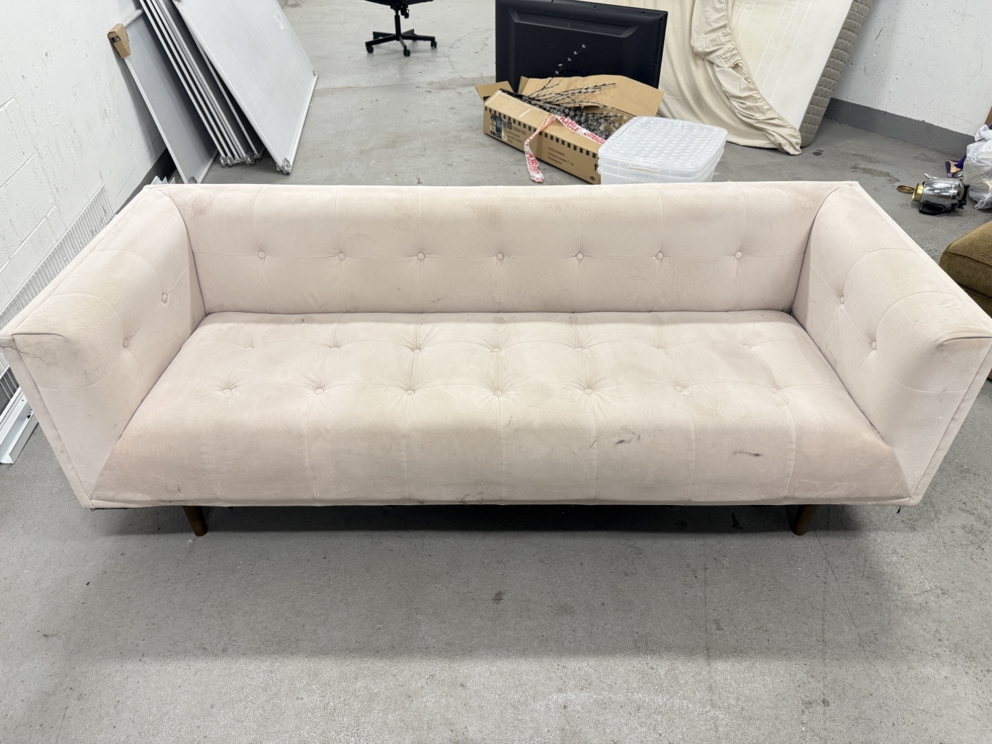 Light Pink Tufted Sofa