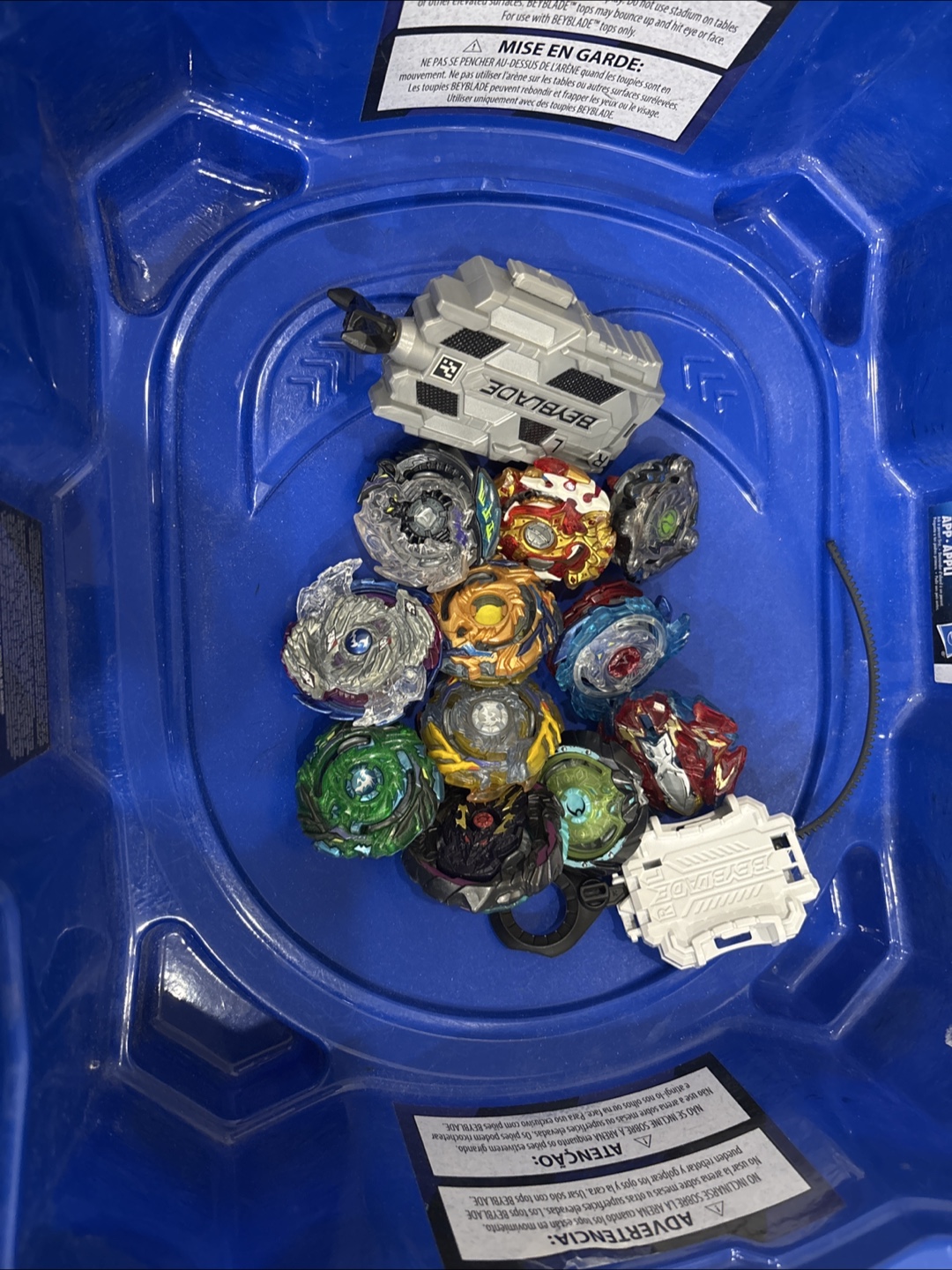Beyblade Lot - Assorted Tops and Launchers