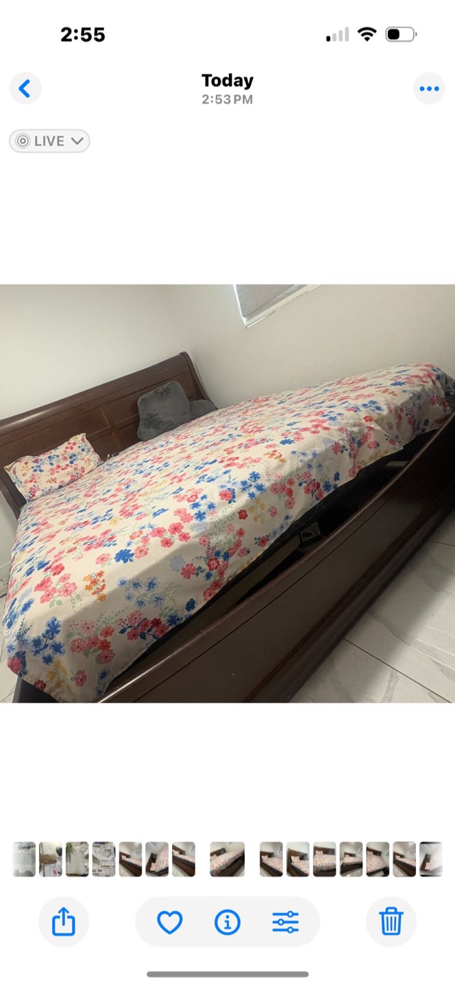 Wooden Bed Frame with Floral Bedding
