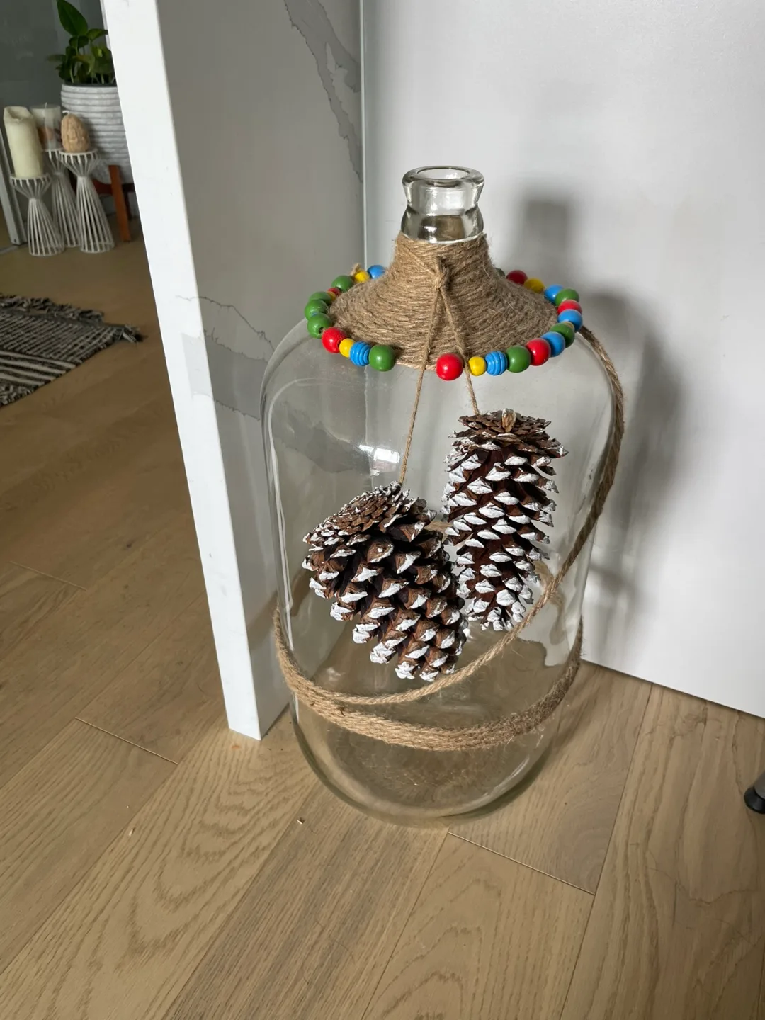 Decorative Glass Bottle with Pinecones thumbnail