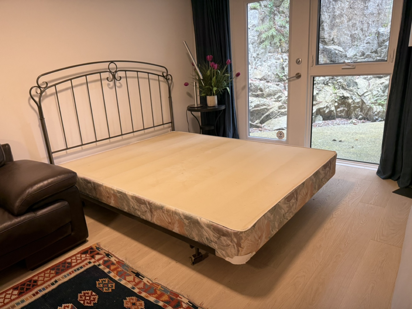 A queen size Metal Bed Frame with Headboard and Box