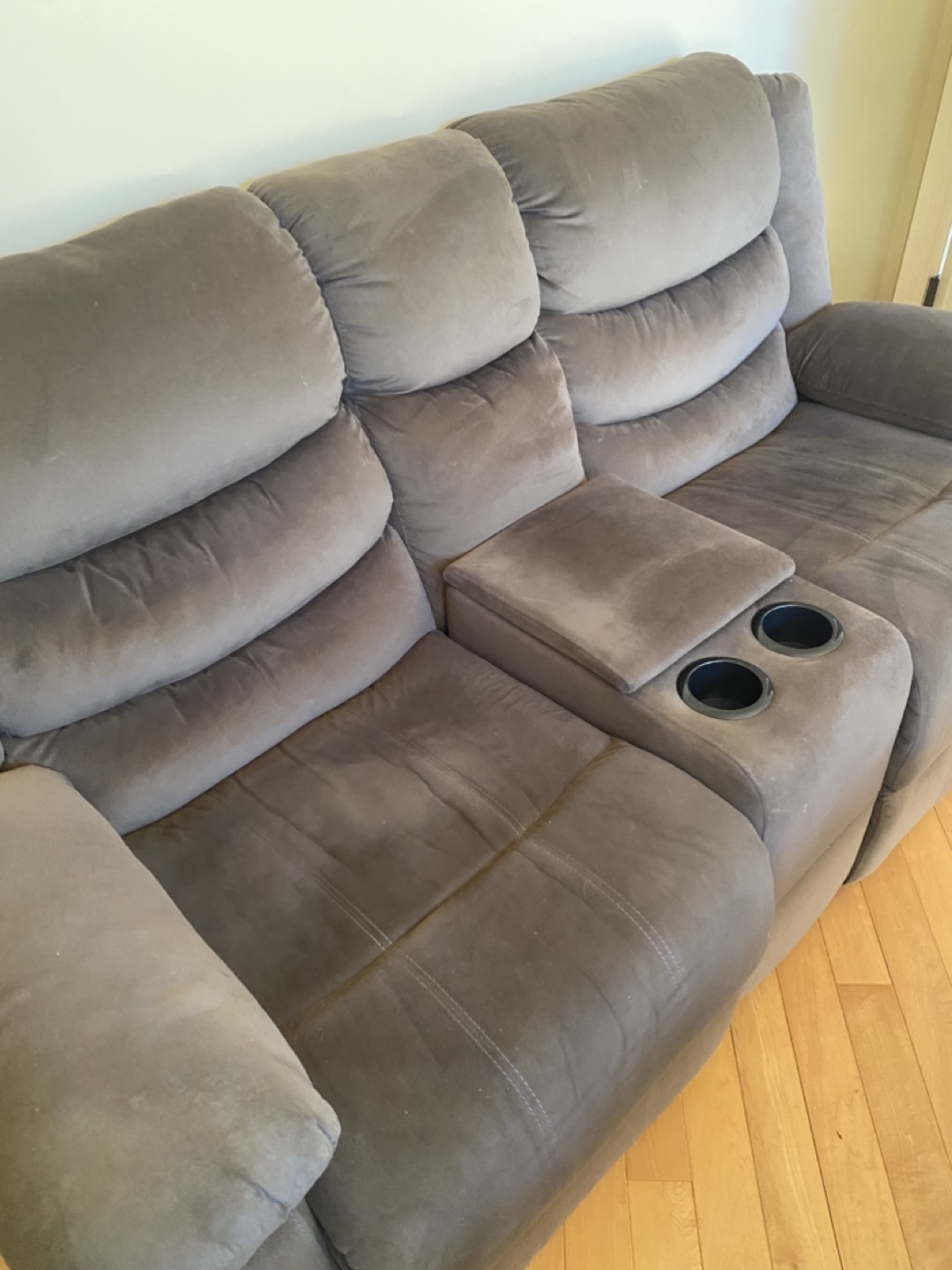 Brown power Reclining Loveseat with Console