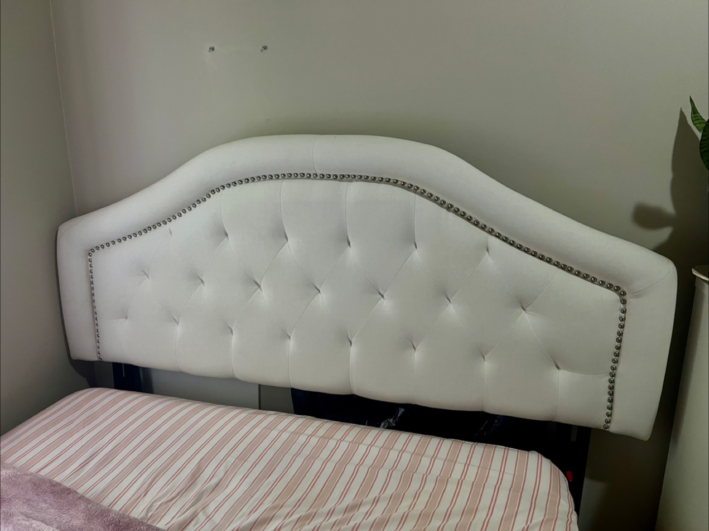 White Upholstered Headboard with Nailhead Trim