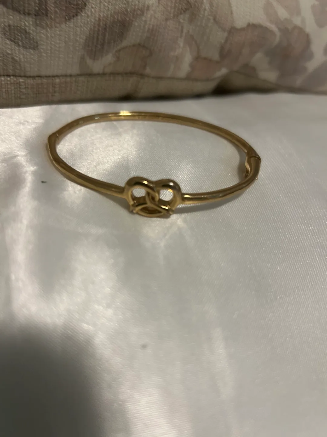 Kate Spade Gold Tone Bangle Bracelet with Knot Design thumbnail