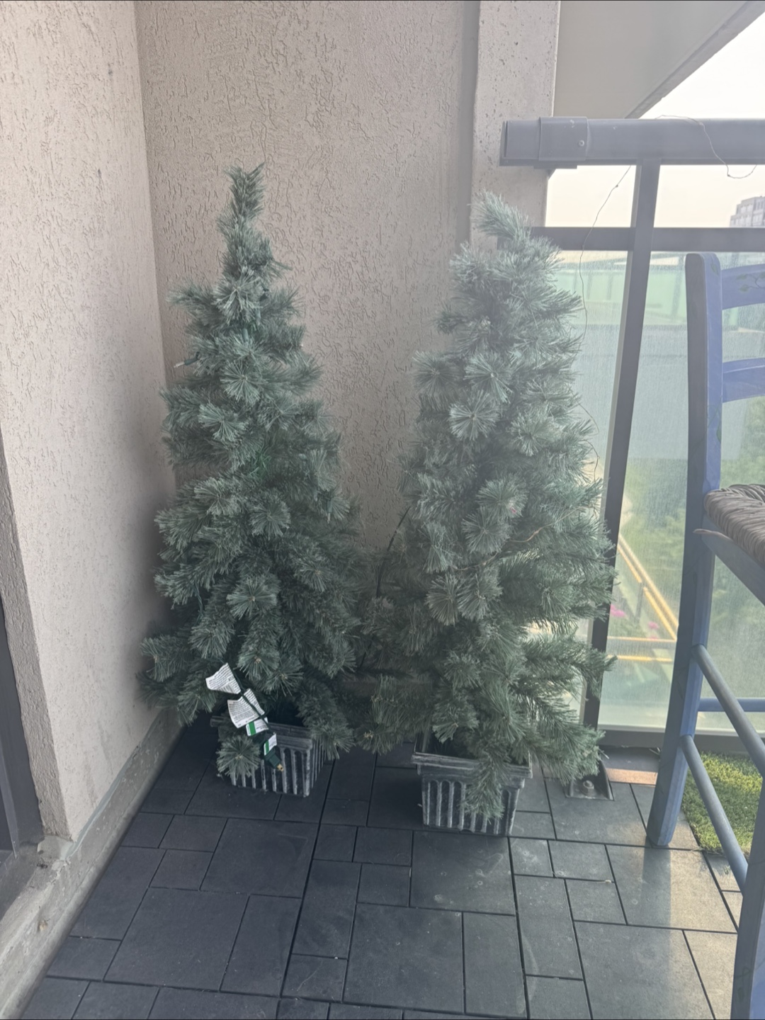 Two Small Artificial Christmas Trees