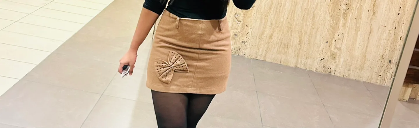Tan Mini Skirt with Bow Detail image indicator(2)
