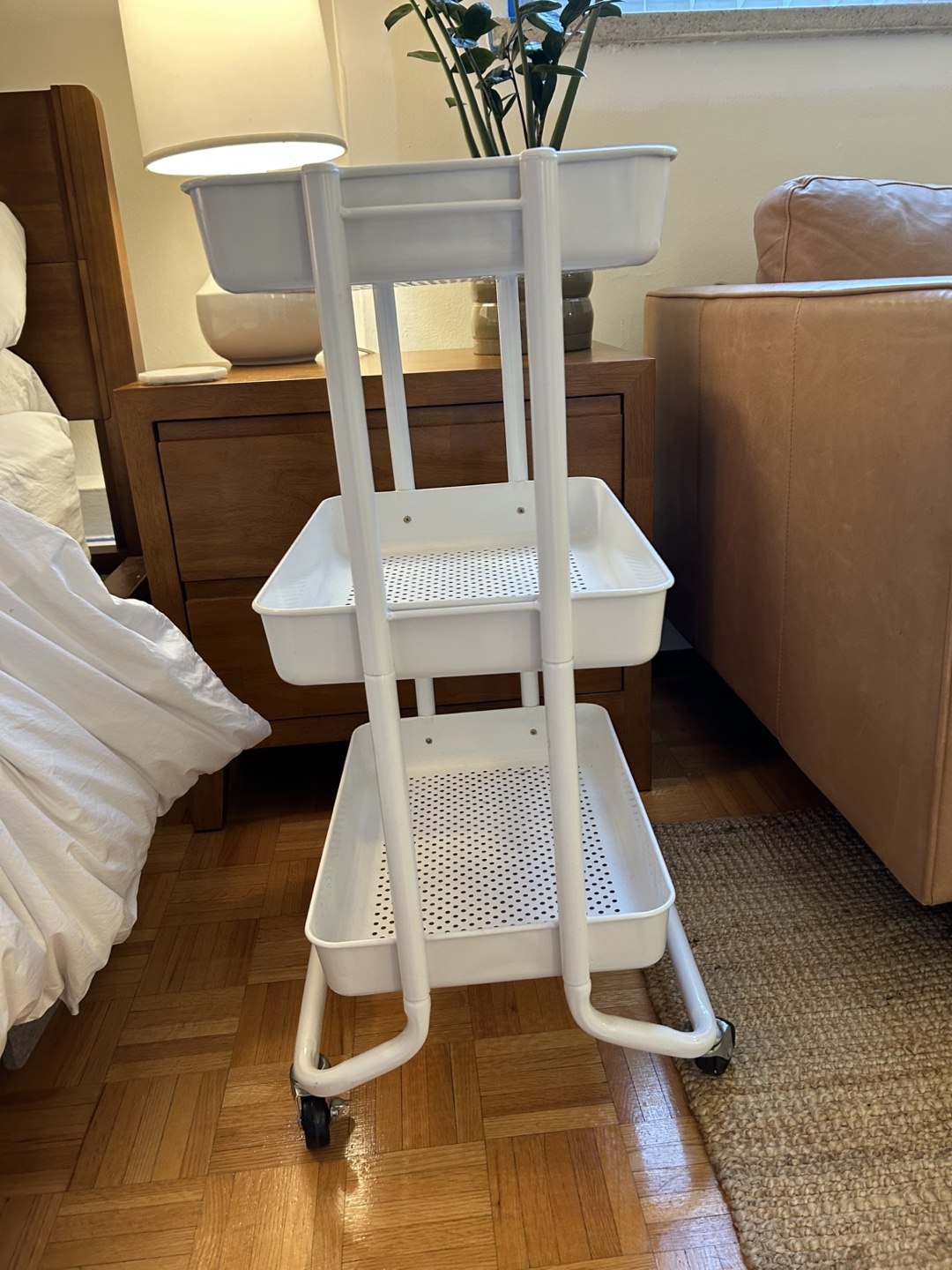 White metal rolling storage cart