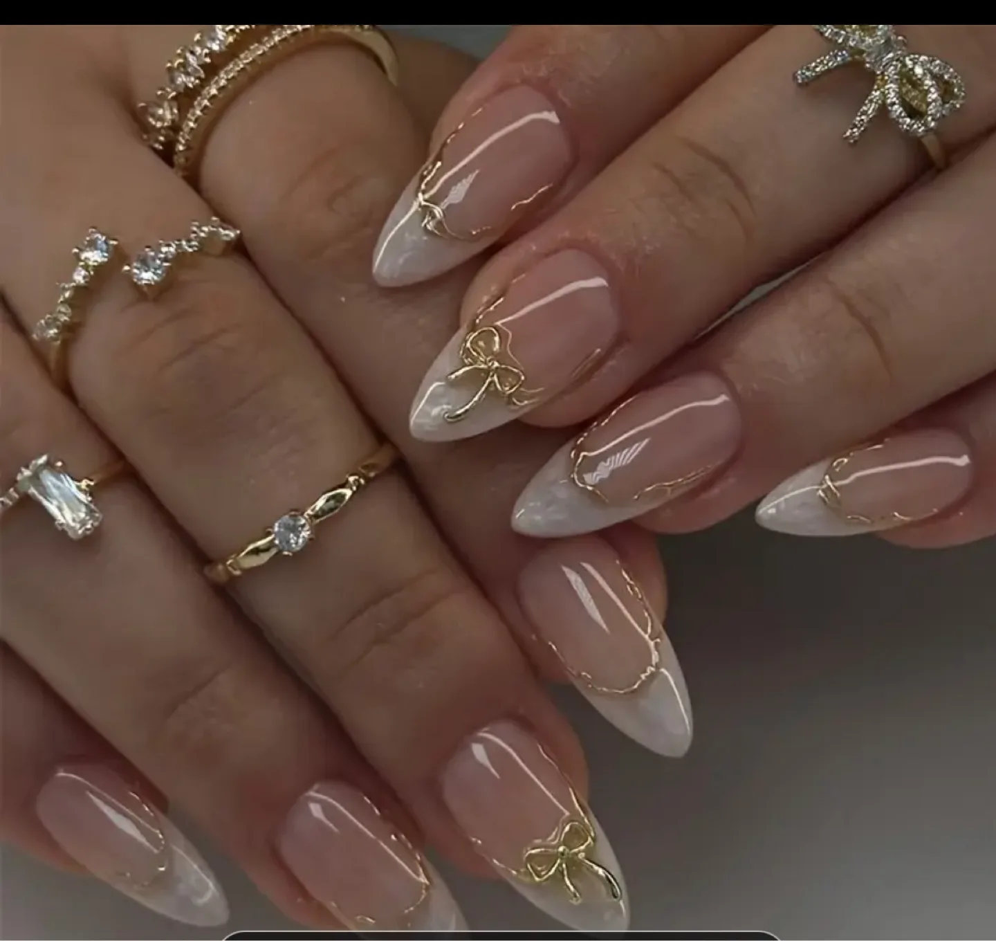 Nail Art with Gold Bow Design thumbnail
