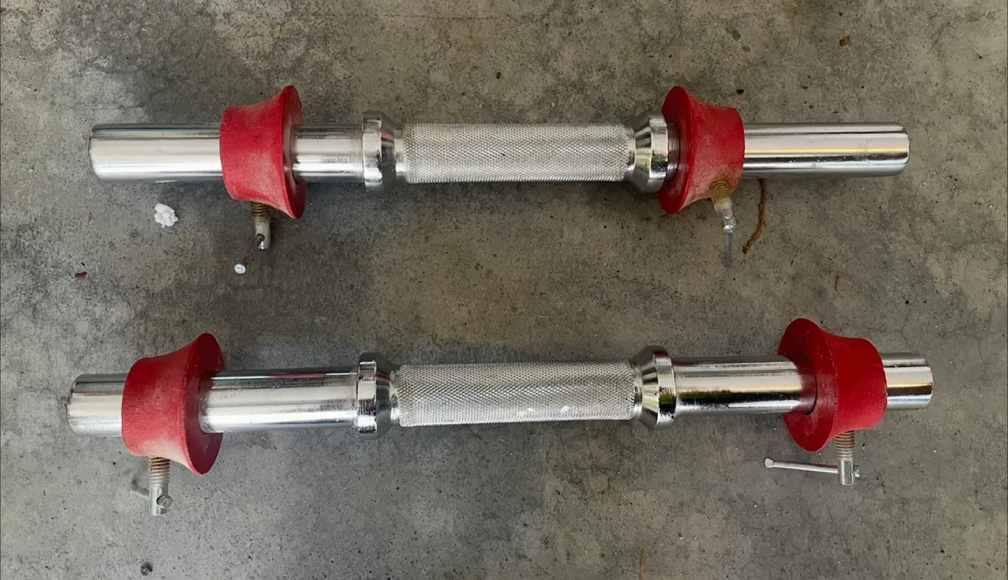 Dumbbell Handles with Red Collars thumbnail