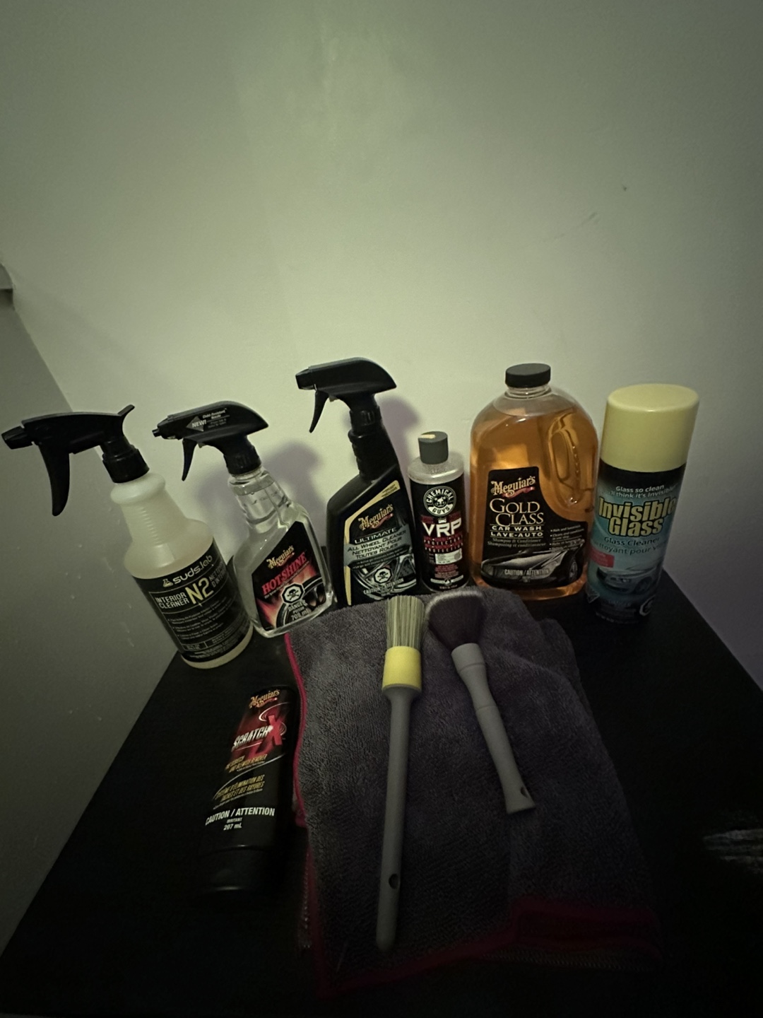 Auto detailing chemicals, microfibre towels, brushes