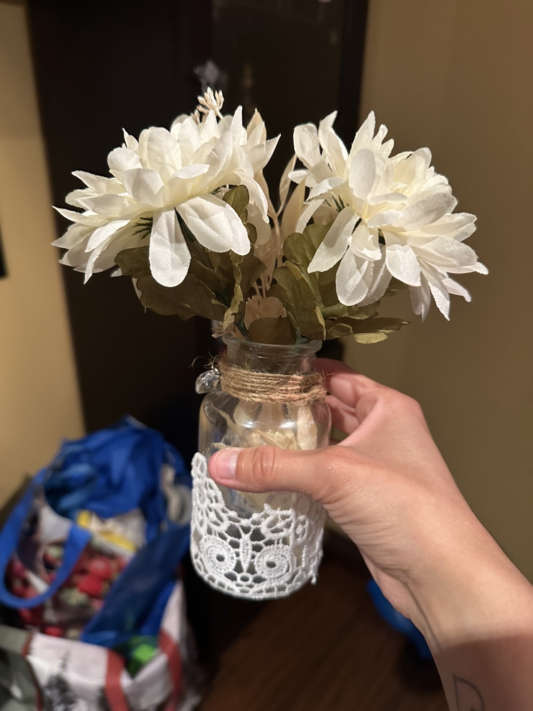 Decorative Flower Arrangement in Glass Jar
