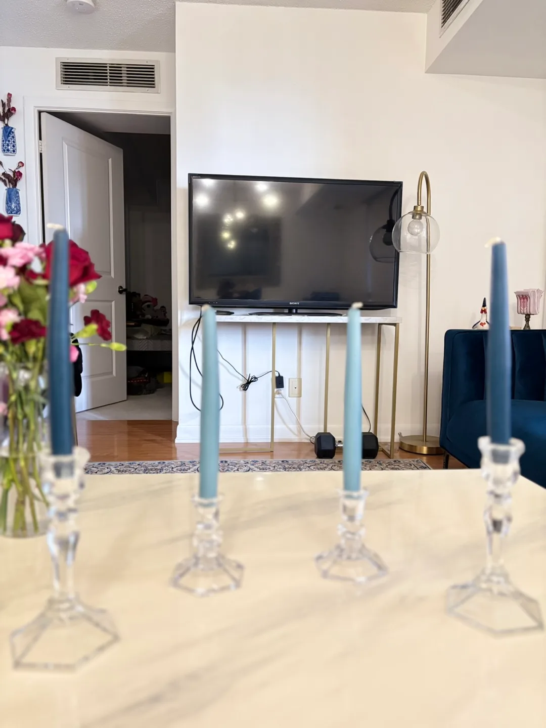 Candlestick Holders with Blue Candles thumbnail