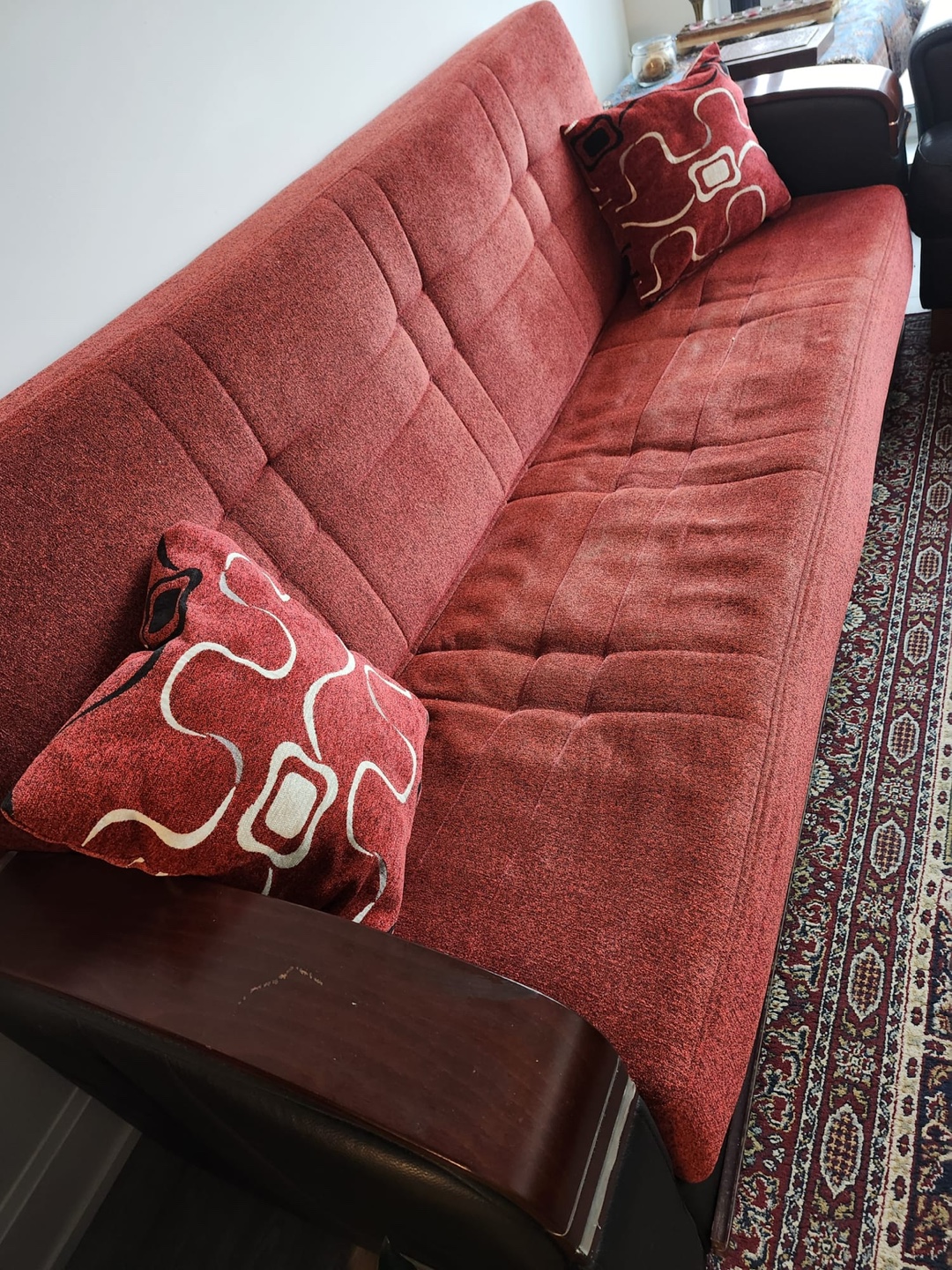 Red Sofa Bed with Pillows