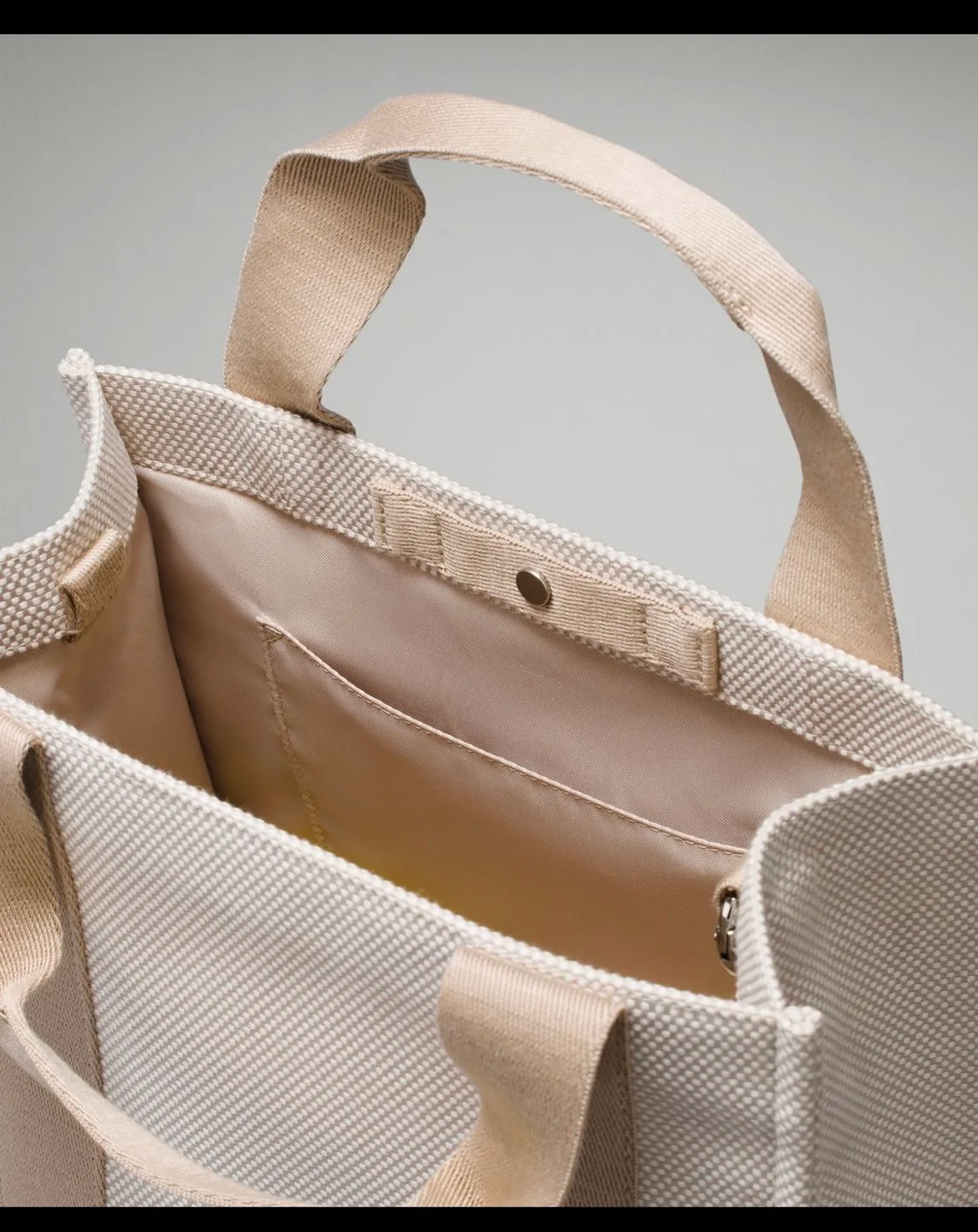 *New** Lululemon Ivory/Beige 2 tone canvas mini Tote Bag image indicator(4)