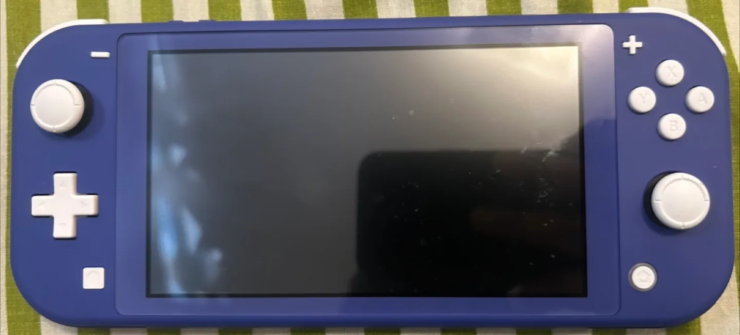 Nintendo Switch Lite Blue + FC25 & The Show 25 Games image indicator(3)