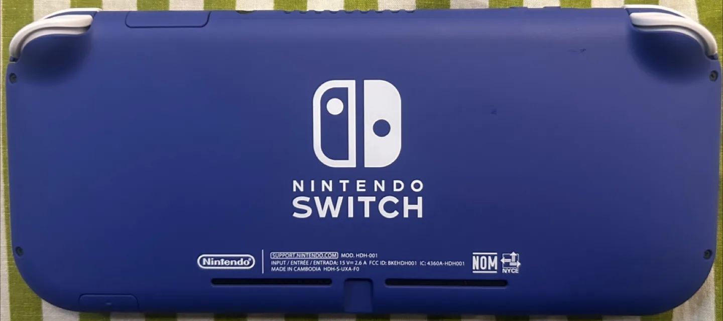 Nintendo Switch Lite Blue + FC25 & The Show 25 Games image indicator(2)