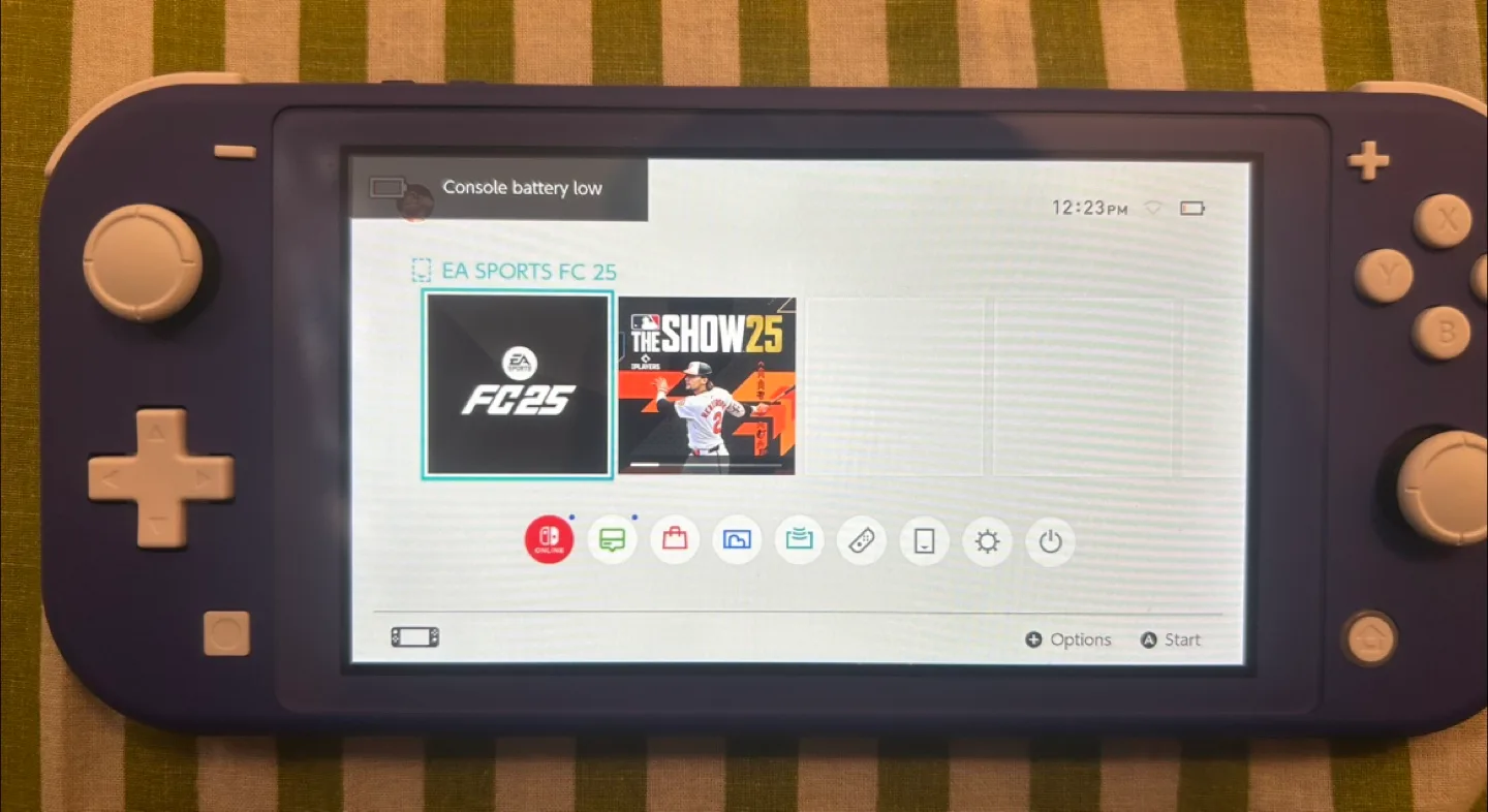 Nintendo Switch Lite Blue + FC25 & The Show 25 Games thumbnail