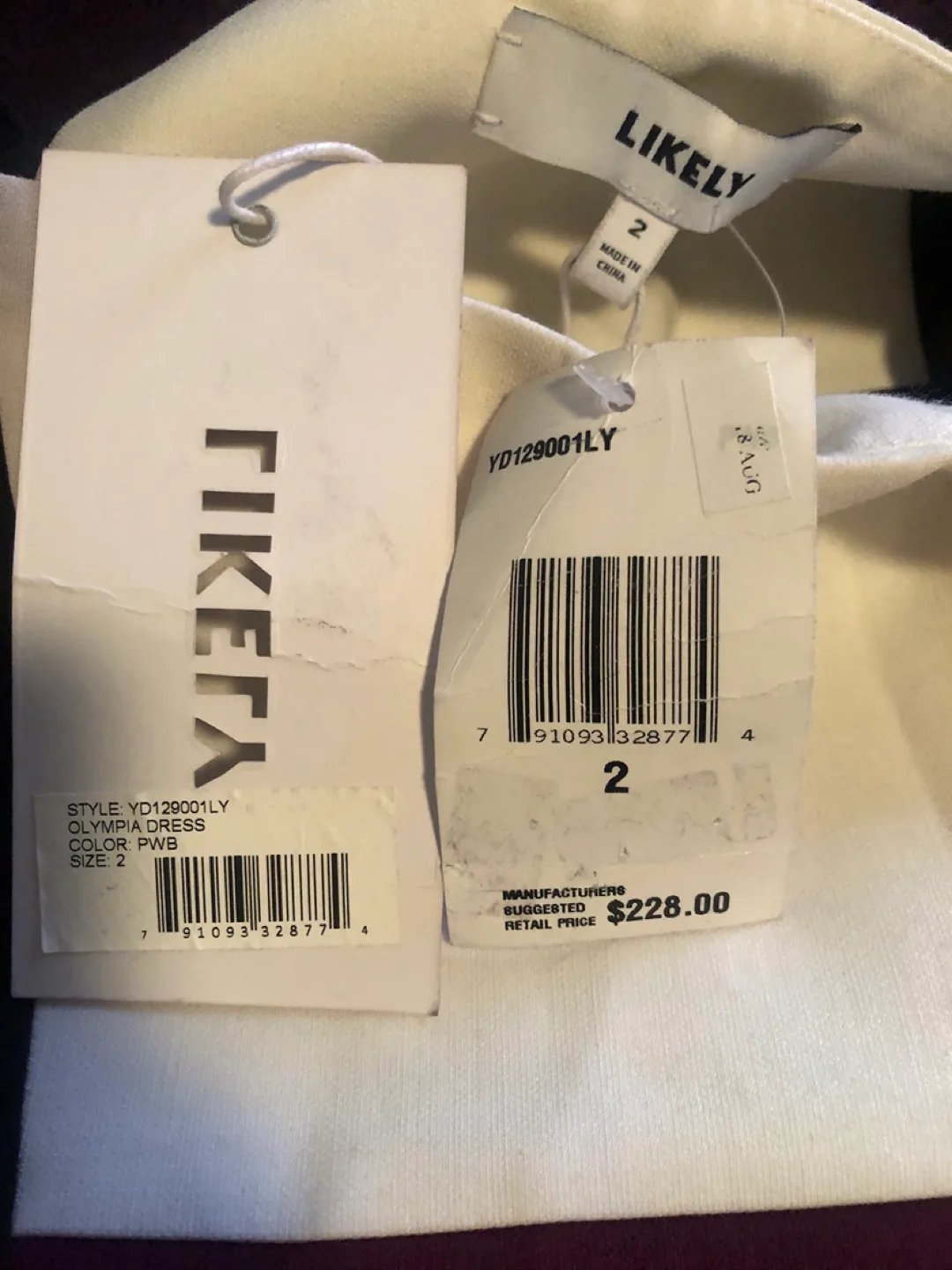 Dress in Plum, White & Black  by Likely image indicator(5)