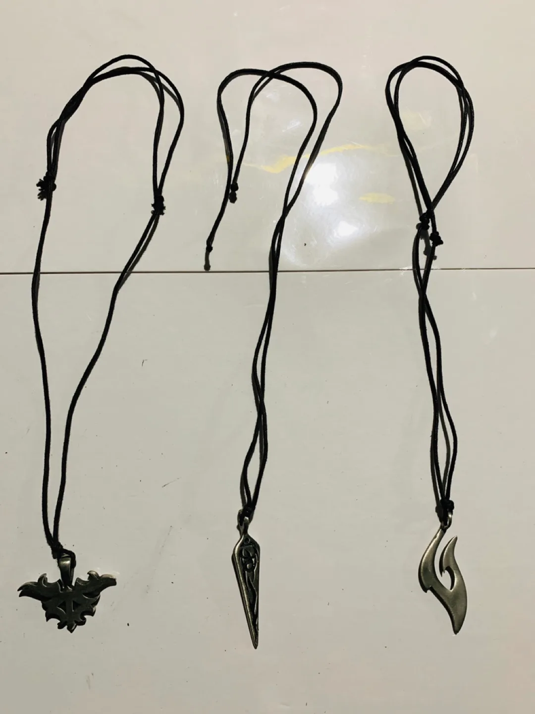 Set of 3 Silver Tone Pendants on Black Cord Necklaces thumbnail