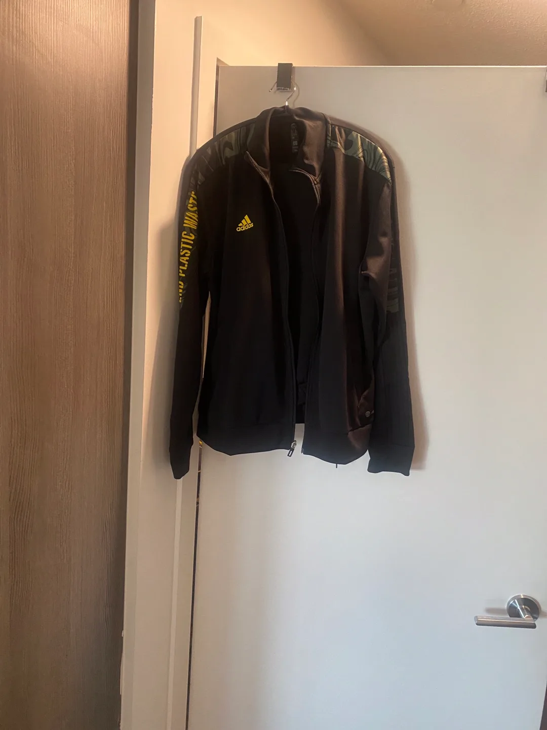 Adidas Track suit.  The top is XL and bottoms are Large. thumbnail