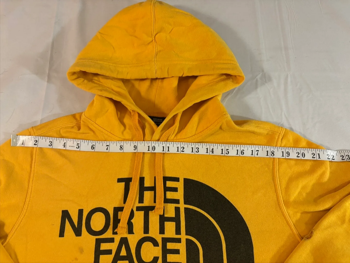 The North Face Yellow Hoodie in perfect condition image indicator(7)