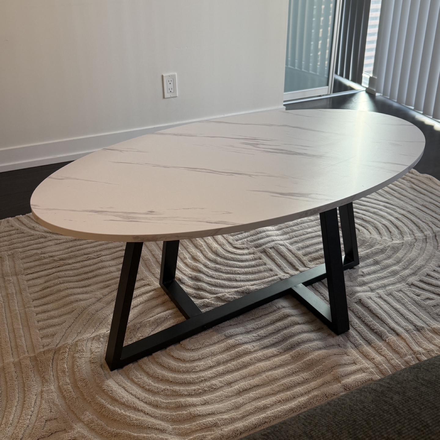 white faux marble oval coffee table